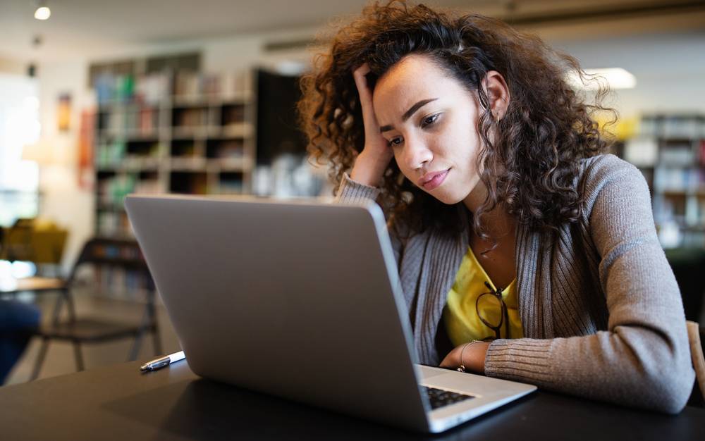Student woman finding it difficult at study