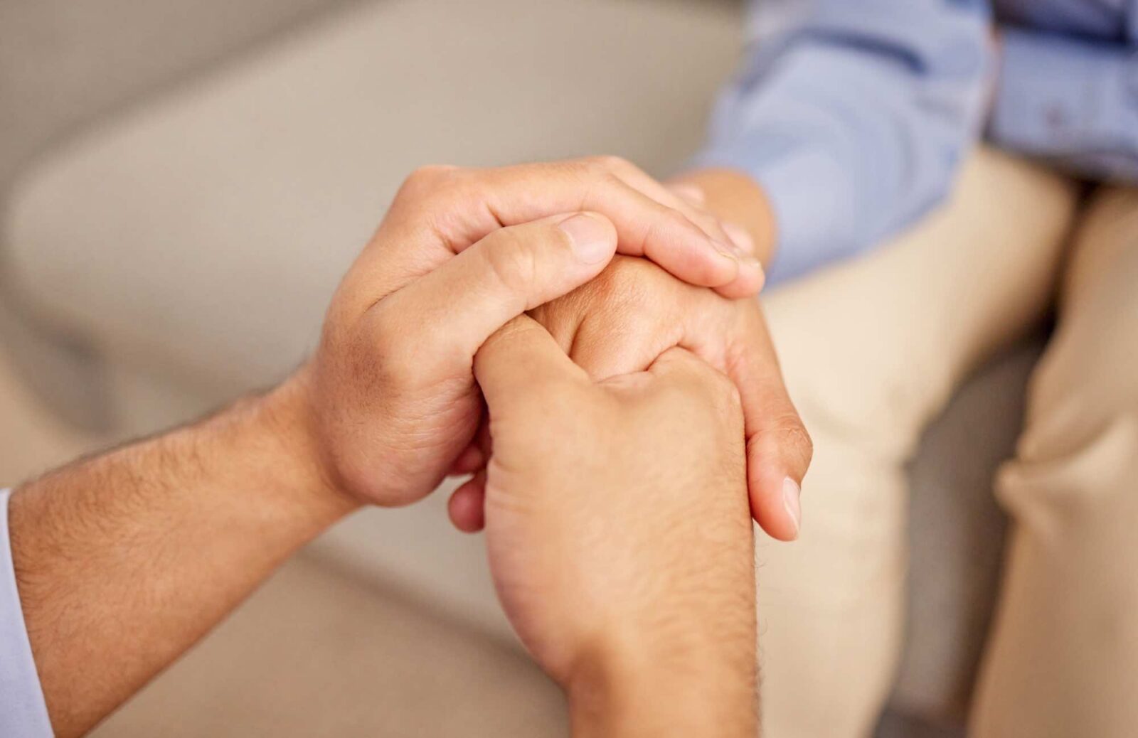 therapist Holding hands of patient for support and wellness
