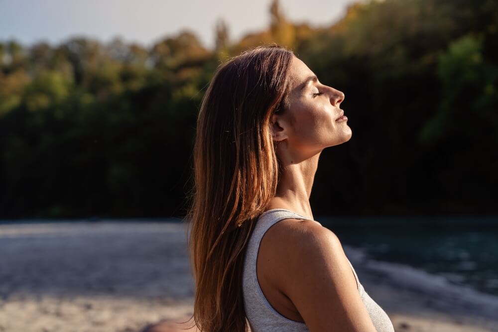 Woman breathing in the fresh air